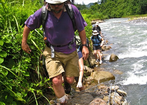 Borneo_Trekking along edge of river in rainforest.jpg