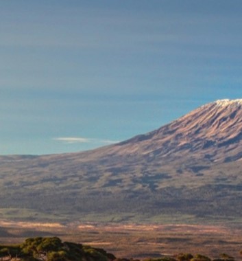 This image shows both peaks of Kibo on the right and Mawenzi. Both used to form the one single mountain before the last eruption, estimated to be 200,000 years ago.