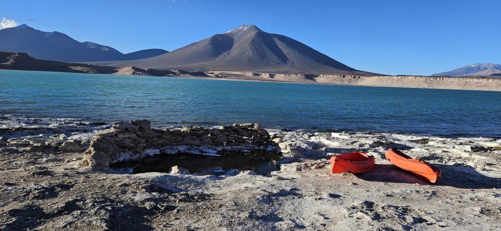 Hot springs and kayaks at Laguna Verde. Ojos del Salado Expedition.